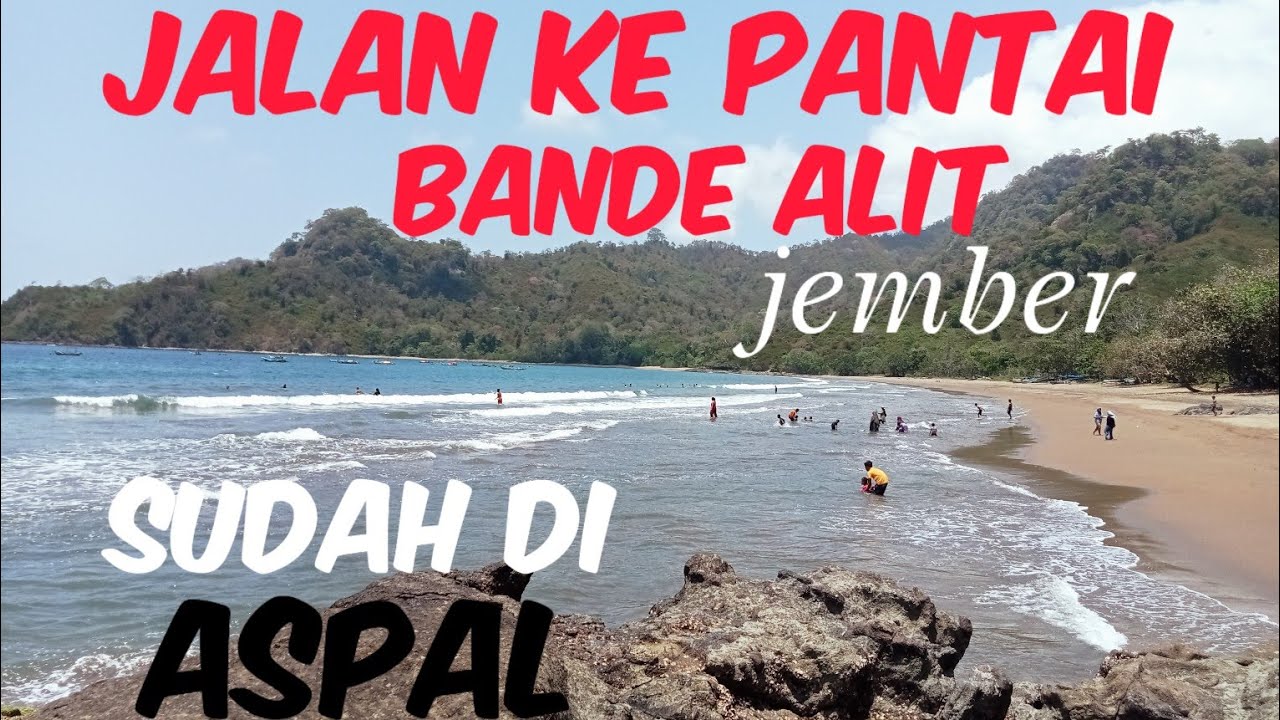 jalan ke pantai bande alit sudah di aspal