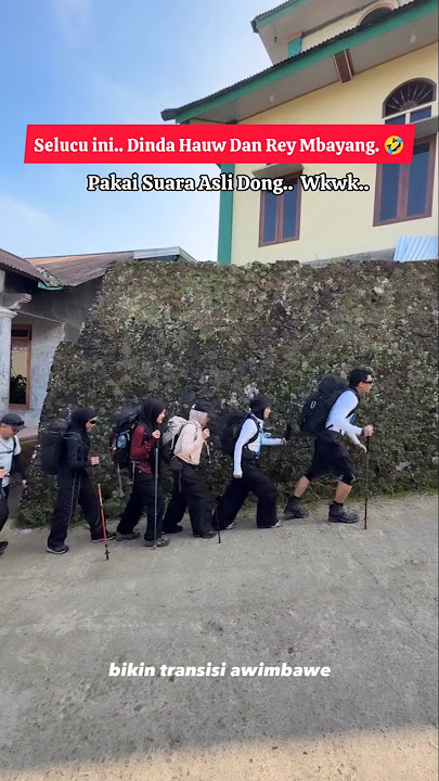 A Funny Moment Between Rey Mbayang and Dinda Hauw Before Climbing Mount Sumbing