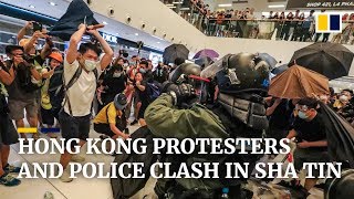 Hundreds of protesters clashed with police in sha tin the northern
part hong kong after a tense standoff. it followed latest protest
march, which o...