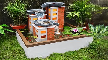 Lạ mắt với mẫu bể cá thác nước thành phố thu nhỏ