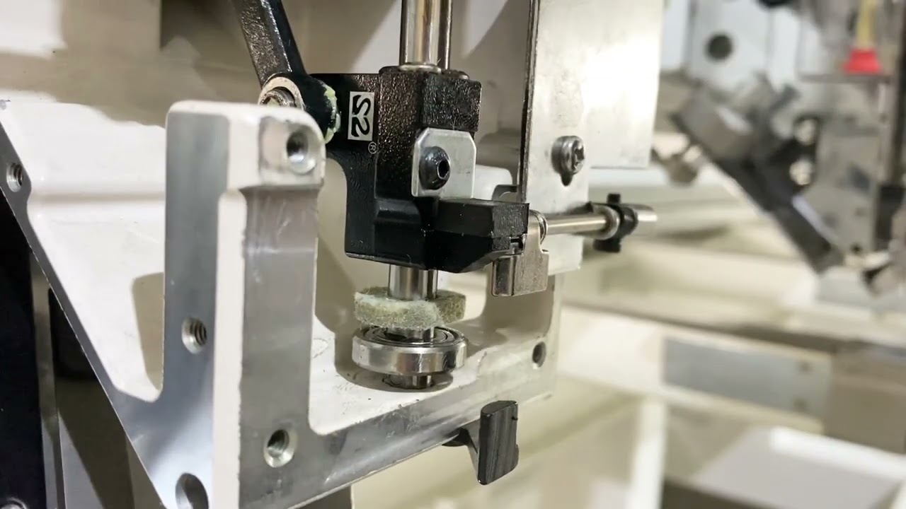 How to replace the reciprocator on embroidery machines ?