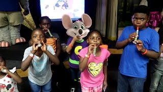 Chuck E Cheese GUINNESS WORLD RECORDS Attempt for the most people blowing party blowers
