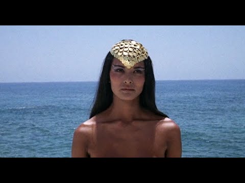 LAURA GEMSER, THE DIVINE EXOTIC GODDESS, ARRIVES ON THE BEACH IN, DIVINE EMMANUEL (1981) HD 1080p