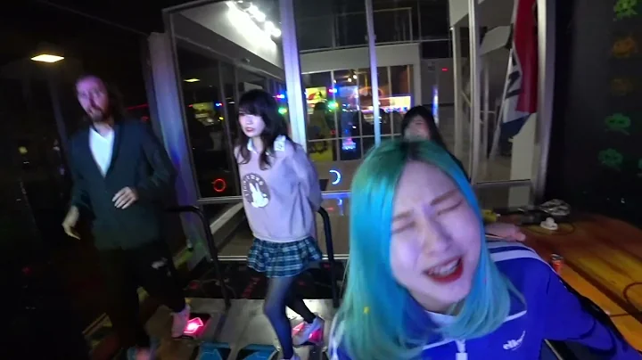 Asmongold plays DDR with Emiru at the Arcade