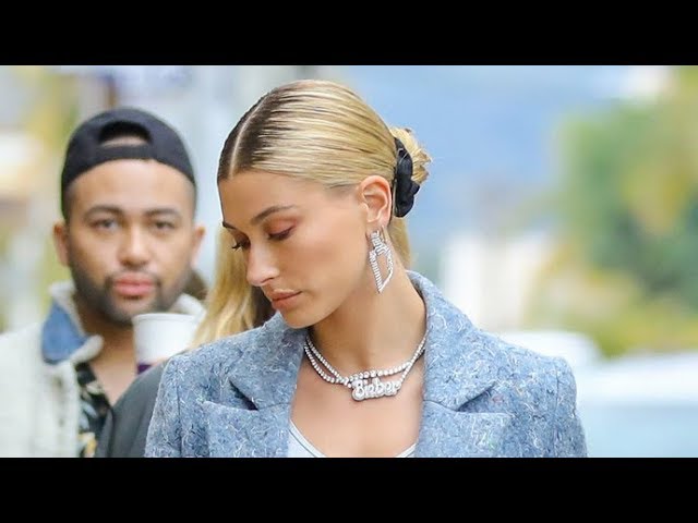 Hailey Baldwin Shows Off 'Bieber' Diamond Necklace Before Packing on PDA  With Justin at Hockey Game