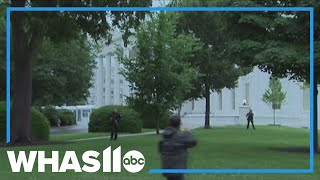 Reporters take cover as gunman open fires at White House checkpoint