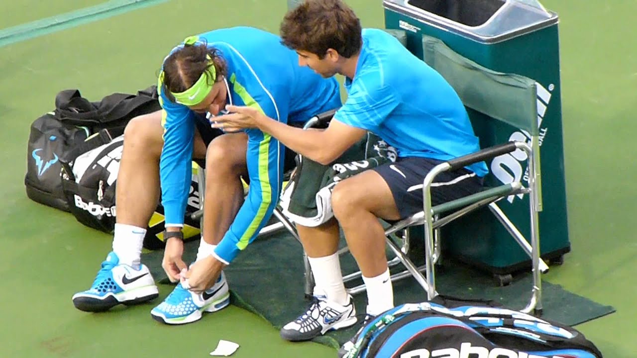 Rafa's sniffing Marc's finger on central court