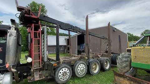 2004 Peterbilt 357 semi straight truck with log bed and Prentice loader model 992287 type 120/JOY