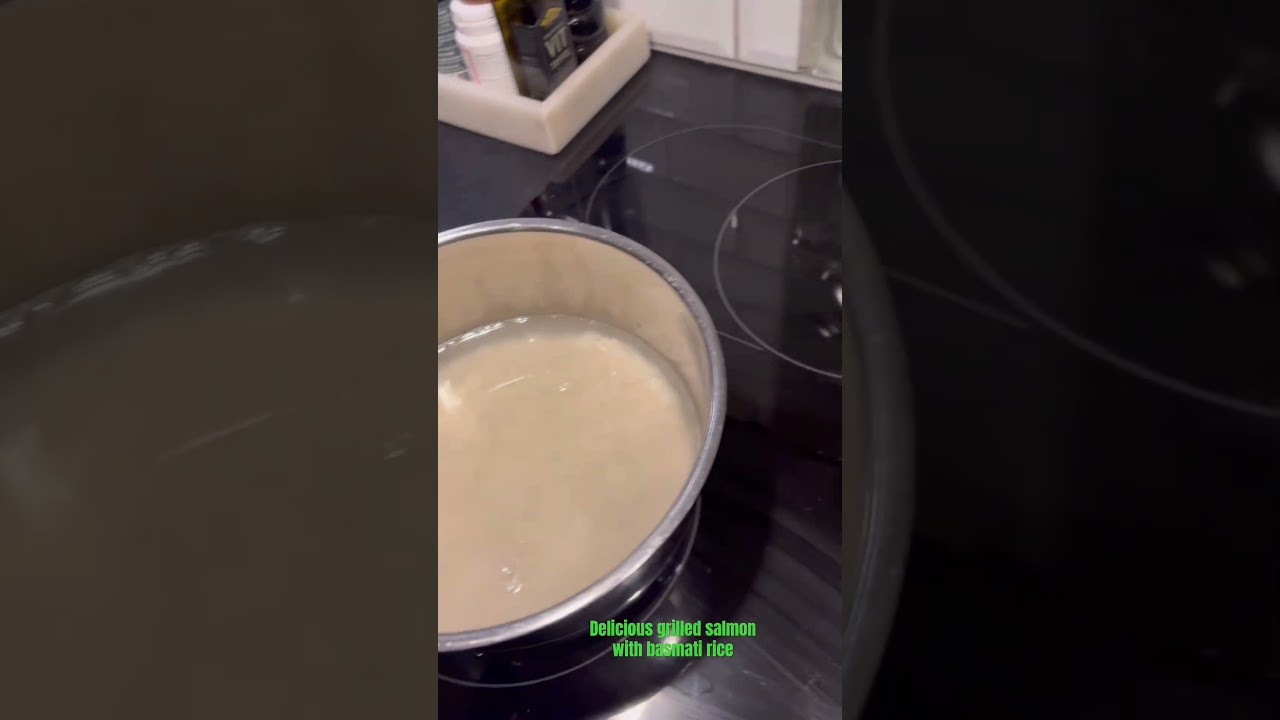 Grilled salmon with basmati rice and avocado and spring onions. 