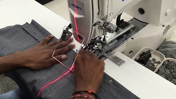 LASER GUIDED BUTTON HOLE AND BUTTON ATTACHING