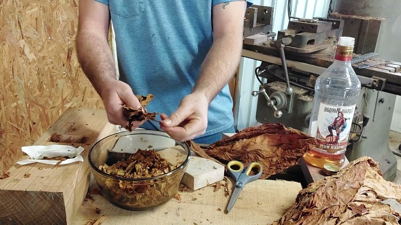 pressing homemade tobacco plug. pipe smoking.