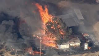 Some evacuations lifted in areas affected by SoCal wildfire