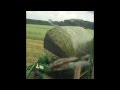 New holland t6020 wrapping silage bales with mchale 991 bjs