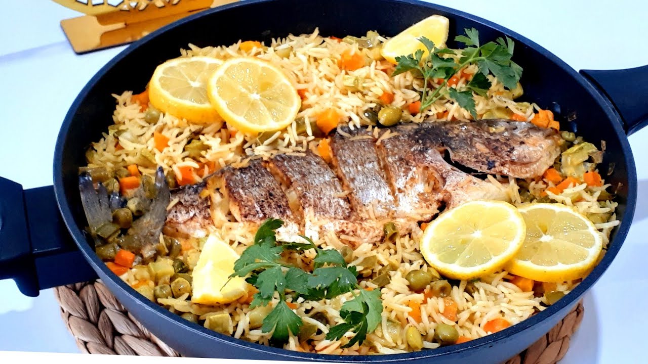 أرز بسمك الدوراد 🐟 و الخضار بتتبيلة رائعة و البنة هبال #وصفات #رمضان 2023