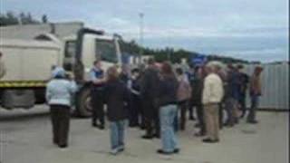 Shell To Sea- Police Escort Trucks Into Refinery Site