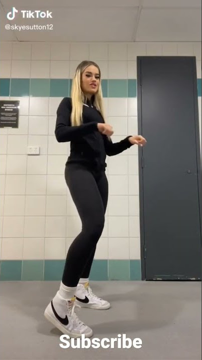 beautiful Russian girl dances in a bathroom