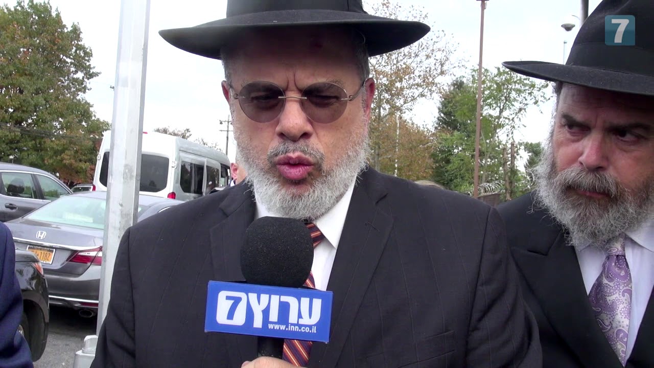 newspaper mockup Dr Joe Frager speaks with Rabbi Yoel Schonfeld at the Ohel