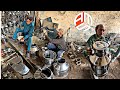 Handmade stainless steel milk cans by an old manwonderful hand making skills