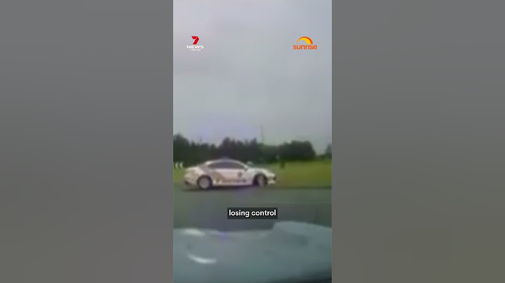Moment Gold Coast hoons taunt police car