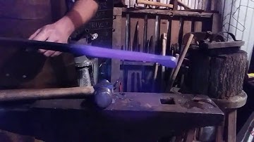 Forging a half penny scroll