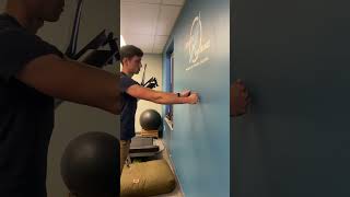 Weight shifting through arms at wall