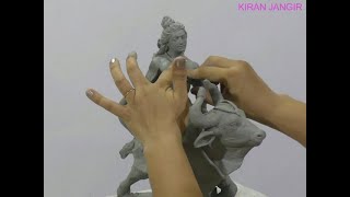 Sculpting Shiv and Nandi in water based clay