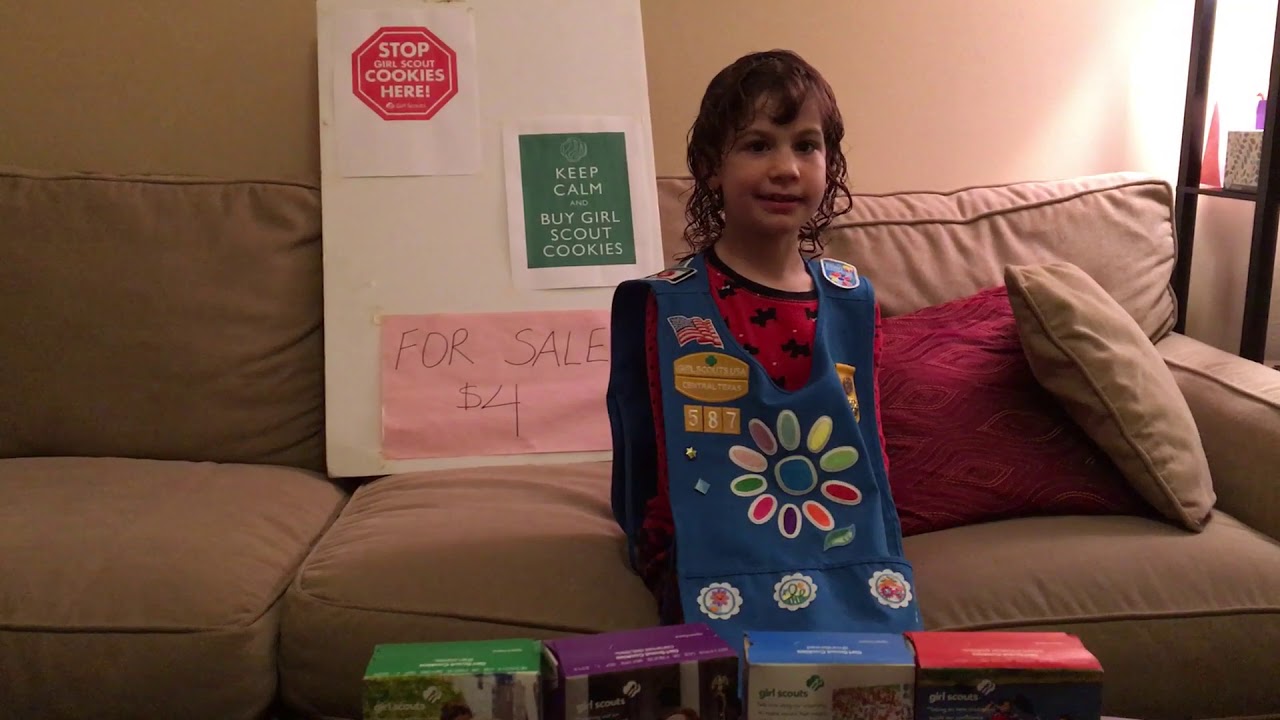 My Daisy selling Girl Scout Cookies!