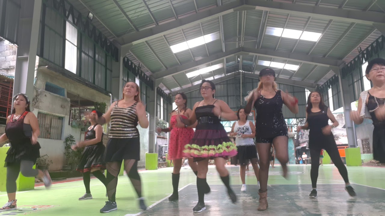Zumba gold in madonna attire(2) dancing in the street