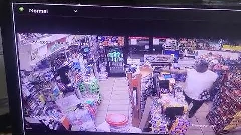 Surveillance video: Store customer shoots would-be robber