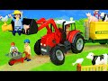 Tractor and Animals Play on the Toy Farm with Kids Songs