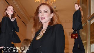 Lindsay Lohan stops for fans as she returns to the plaza hotel while promoting in New York City