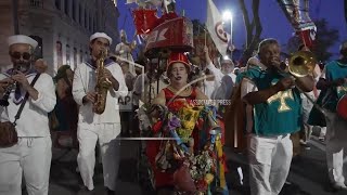 In an interfaith procession in Rio, performers celebrate All Saints' Day