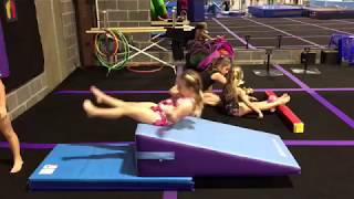 How To Coach Beginner Tumbling: The Backward Roll