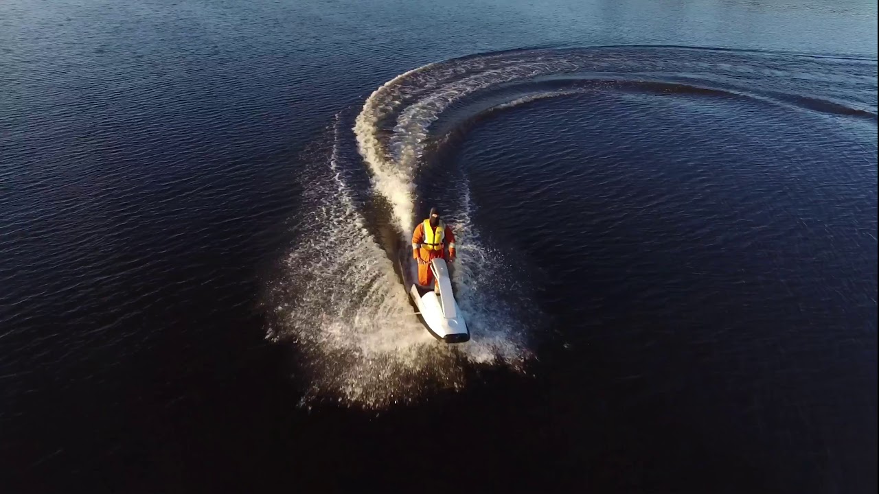 Blue-haired petite teen riding a jet ski - wide 3