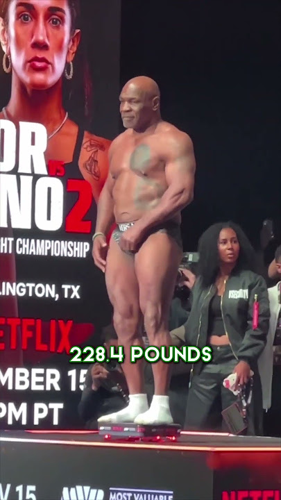 Mike Tyson makes weight and shows off his intimidating physique ahead of his fight against Jake Paul