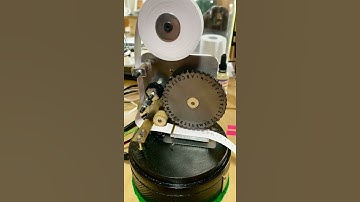 Modern Stock ticker machine printing