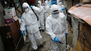 Troops in disinfection operation in Seoul's as South Korea declares 'war' on coronavirus