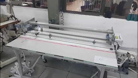 Máy cắt chun và chấm dấu tự động