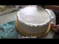 Выравнивание торта белково-заварным кремом.