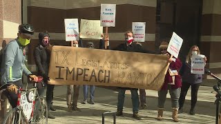 Demonstrators call for Texas Attorney General's resignation