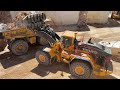 Brand new volvo l350h wheel loader loading caterpillar 773d dumper  birros marble quarries  4k