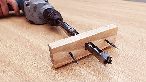new invention uses a handheld drill to create square mortises using a circular core drill bit