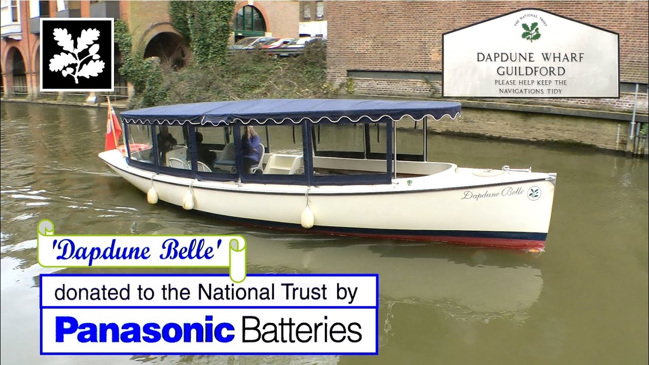 National Trust UK Electric Canal Boat. Brief History, Wey Navigation, Surrey, UK. Dapdune Wharf