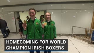 Joyous homecoming for world champion boxers