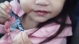 Toddler caught eating what she&#39;s not supposed to. her reaction when mom asked if she liked it! Cute