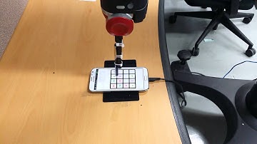 A Baxter Research Robot Plays the 2048 Game using  with Deep Reinforcement Learning