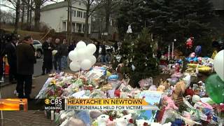 Holiday week is full of funerals for Newtown, Conn.