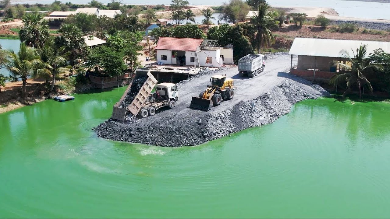 International Wheeloader SDLG Working, Heavy Dump Trucks Transporting ...