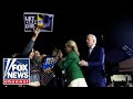 WATCH: Angry protesters storm the stage at Biden's Super Tuesday rally