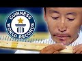 Most needles threaded with the mouth  guinness world records